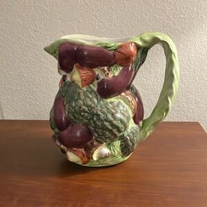 Purple and Green Ceramic Pitcher with Organic Design